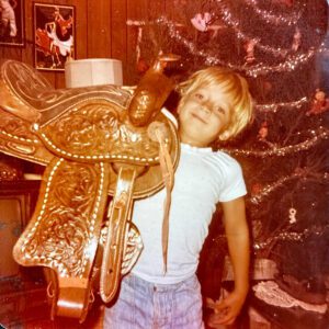 Bear's first horse saddle on Christmas Day